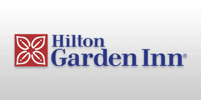 Hilton Garden Inn with Maple Park & Ride logo