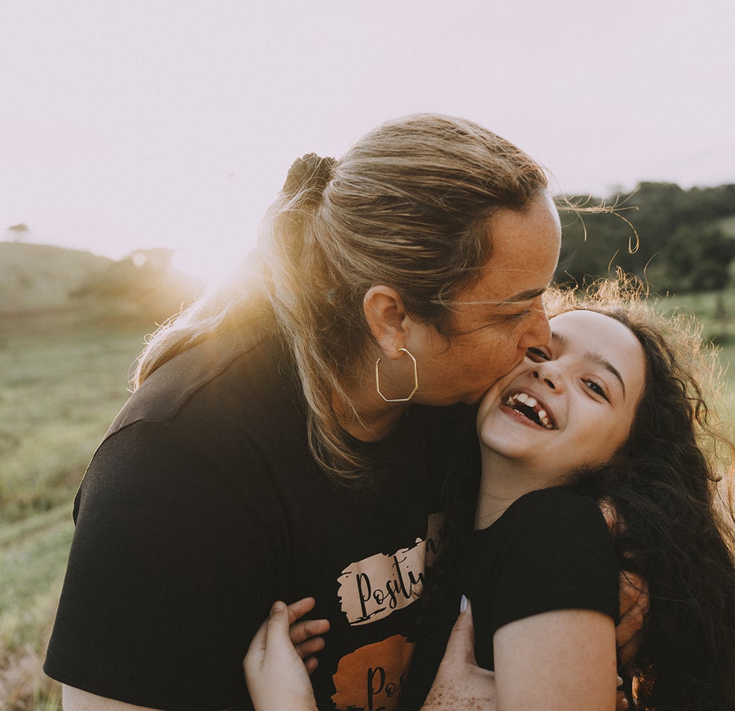 Mom and daughter in field