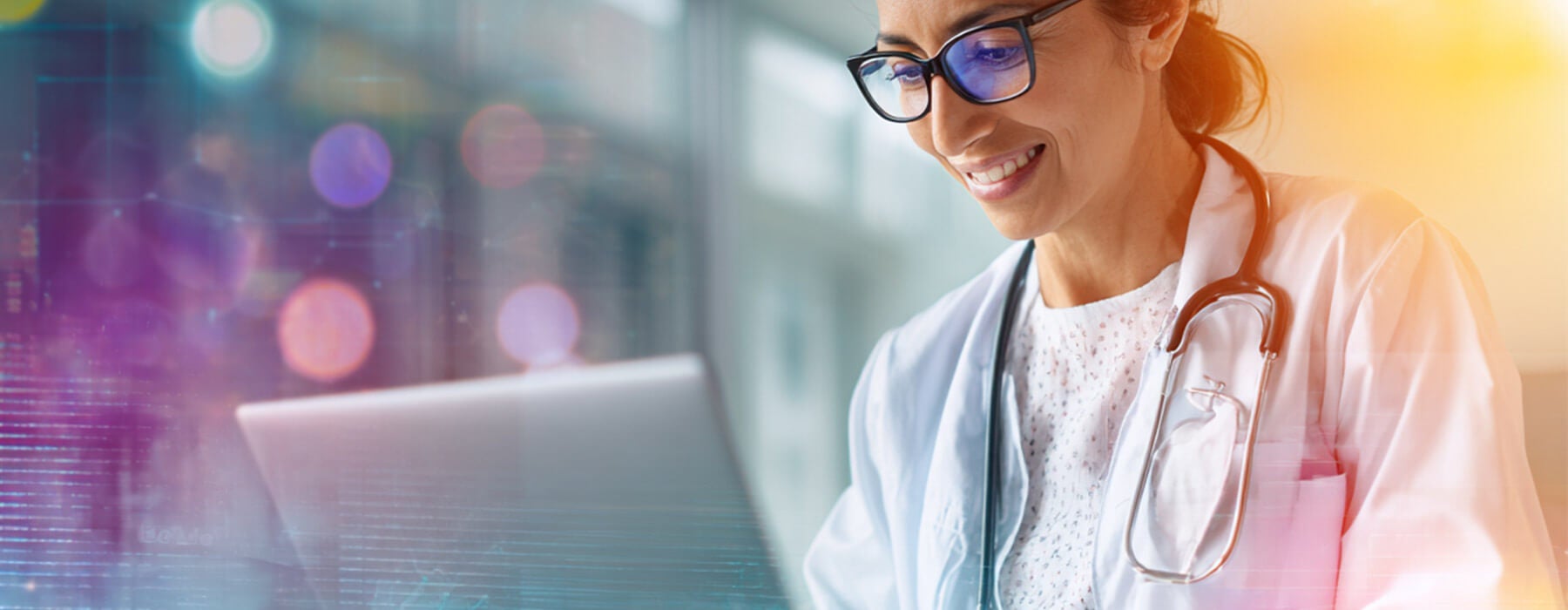 Doctor using AI on laptop