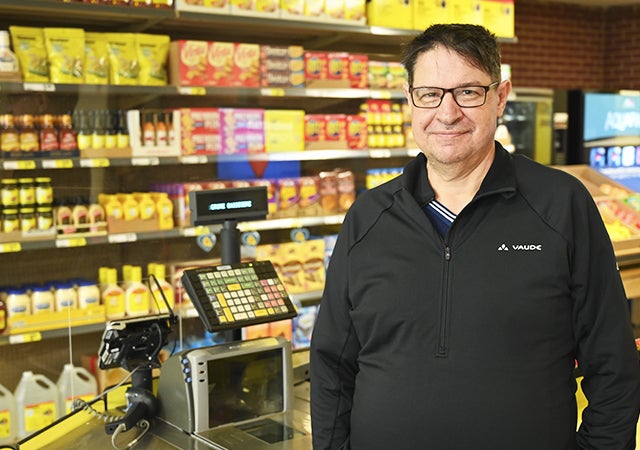 Pierre Quenneville, participant in the Polaris Enterprise program, practicing his skills at the mini-market at Wagar Adult Education Centre. (Photo, Andre Pereira)