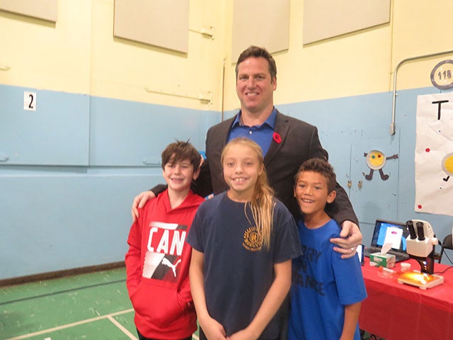 an athlete with students