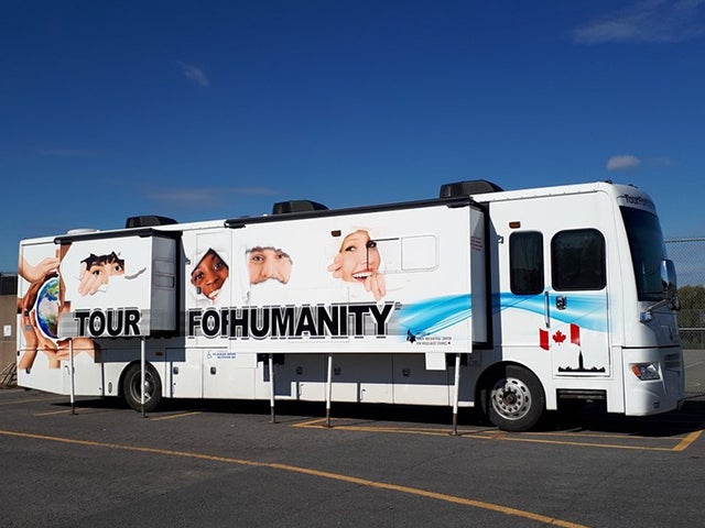 tour for humanity bus