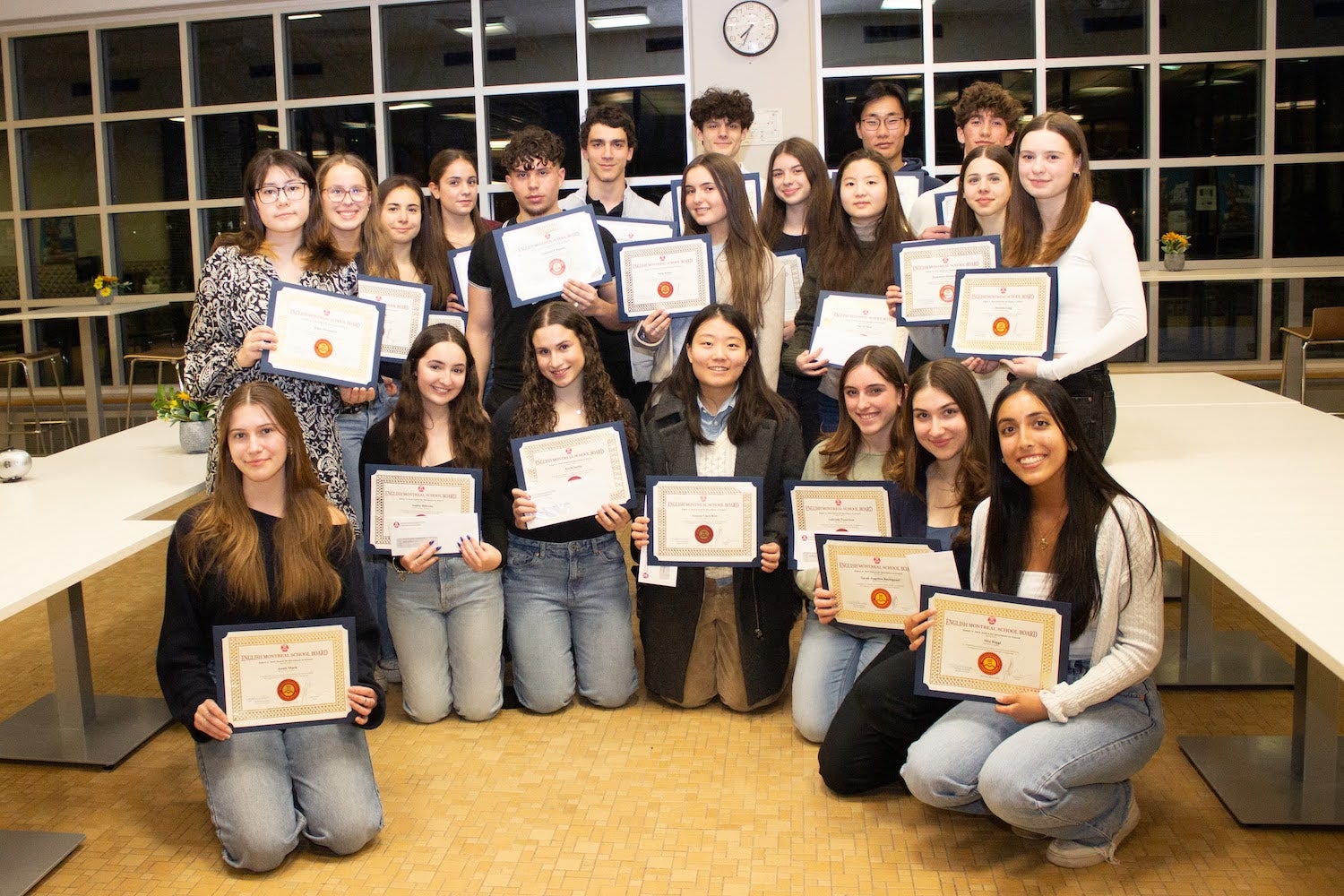 students holding their peck award