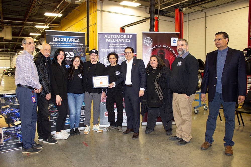 Quebec race car driver Alex Tagliani pays special visit to LMAC Career Centre and meets with auto-mechanic students and staff