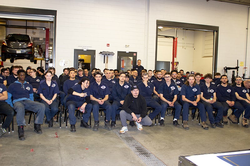 Quebec race car driver Alex Tagliani   pays special visit to LMAC Career Centre and meets with auto-mechanic students and staff