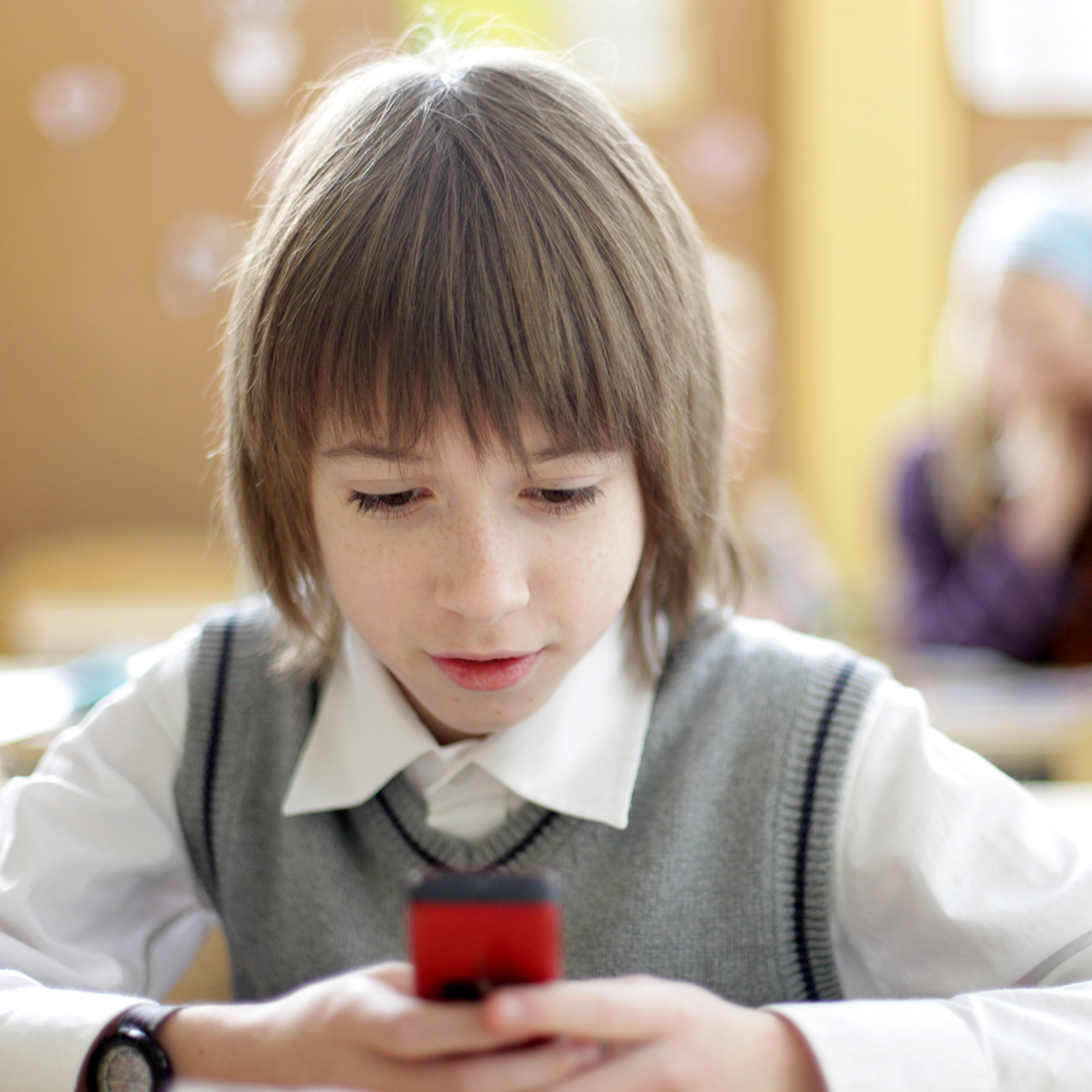 student on phone