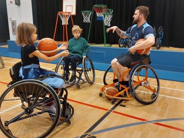 From left: Victoria and Felix play with William Gamache