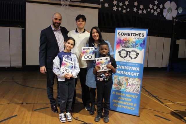 Steven Atme with students.