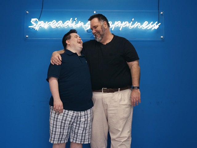 Zach Reisman and Lorri Benedik of Zach Designs share their selection of cards. (Photo, Manny Reisman)