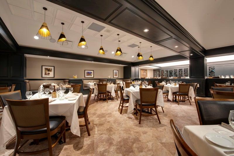 The elegant dining room at Ruth’s Chris Steak House in Toronto.