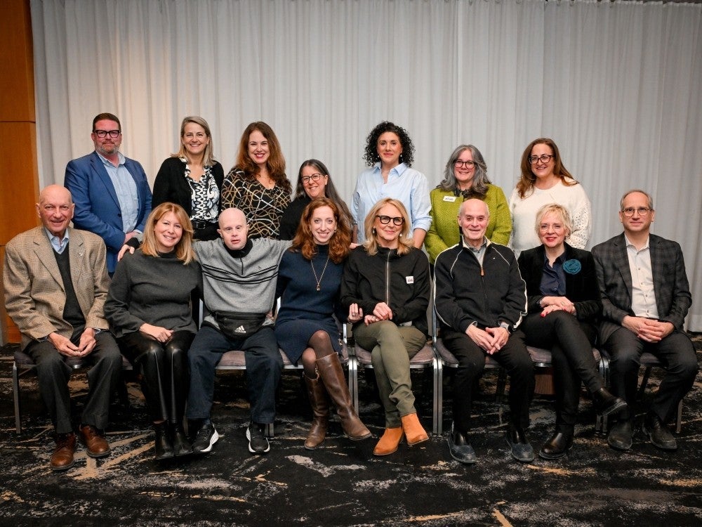 A group of administrators and funders face the camera at the Alink Foundation’s Lunch and Launch 