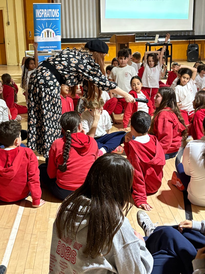 Samara with students at Merton Elementary School