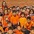 students wearing orange tshirt