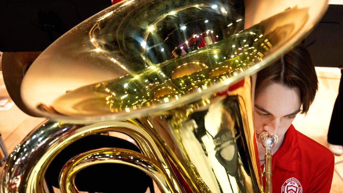student playing music