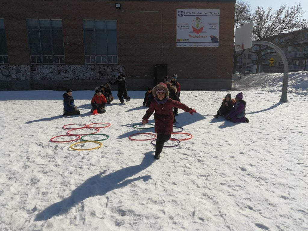 Image showing young students of a local school playing.