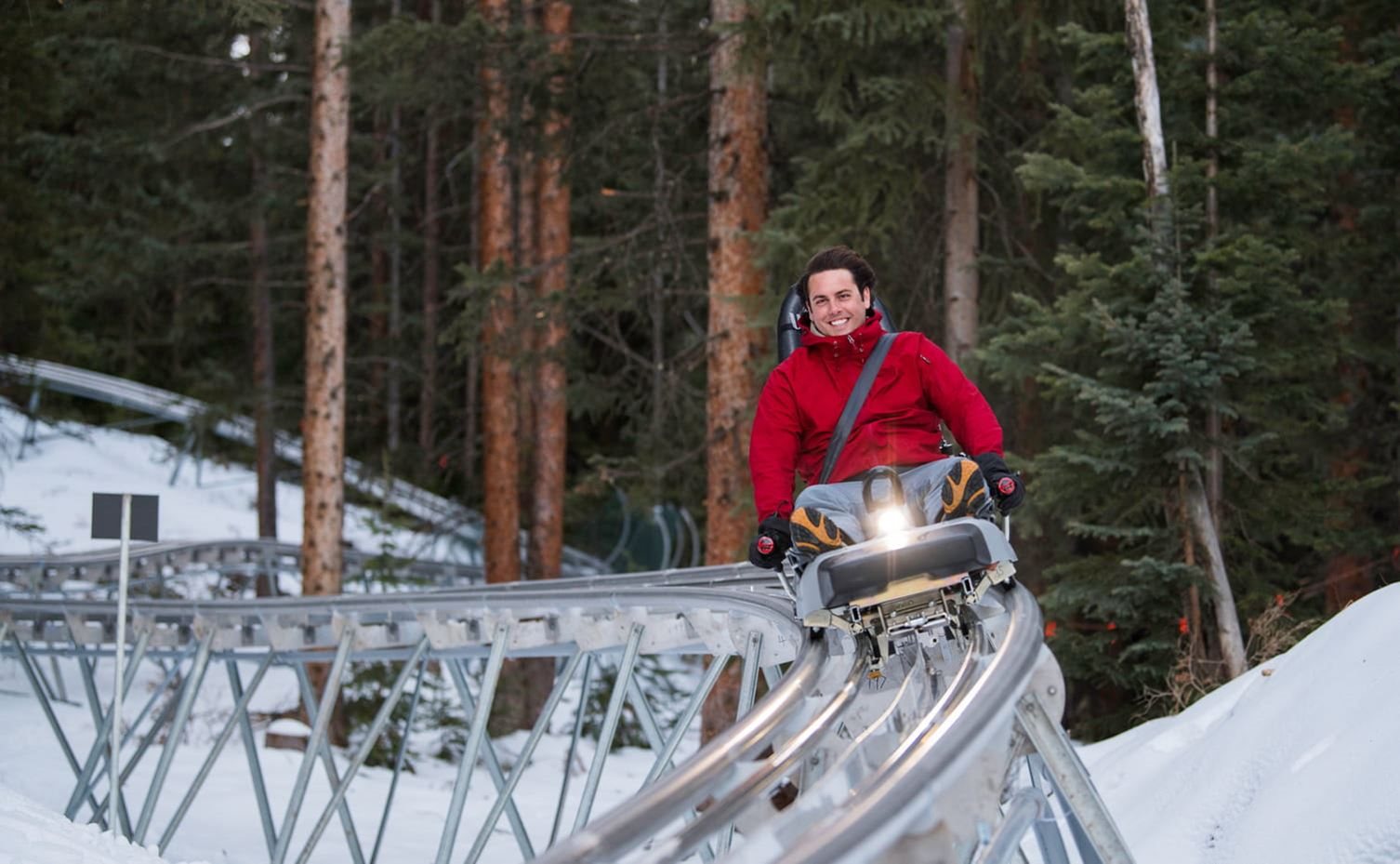 man on alpine coaster in winter