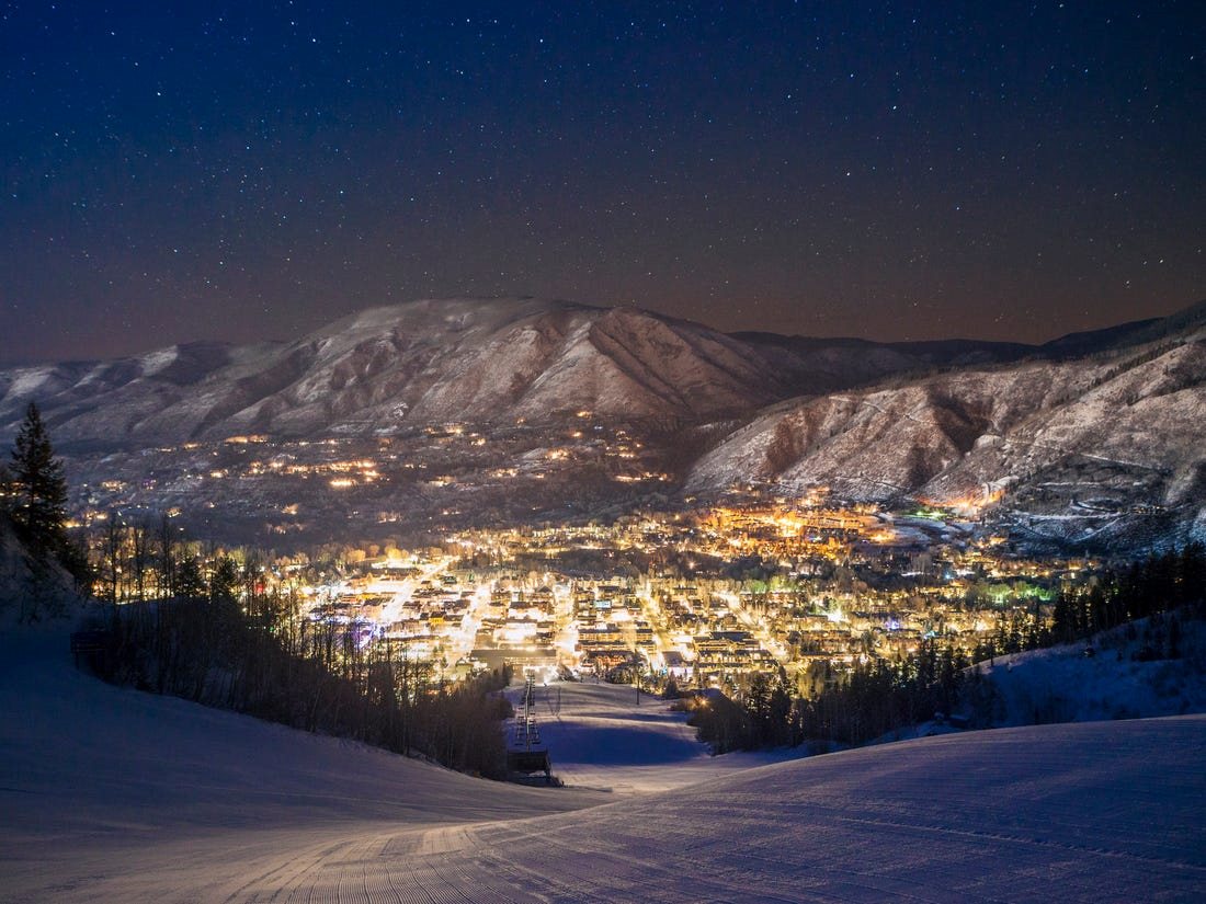 shining lights looking down from aspen snowmass mountain