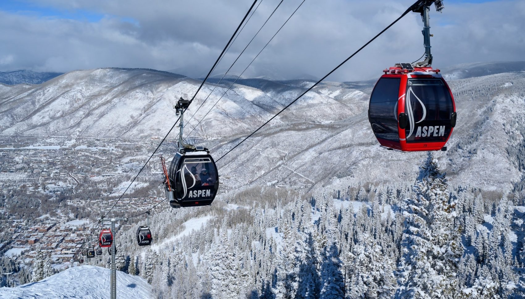 aspen gondola snow and mountains