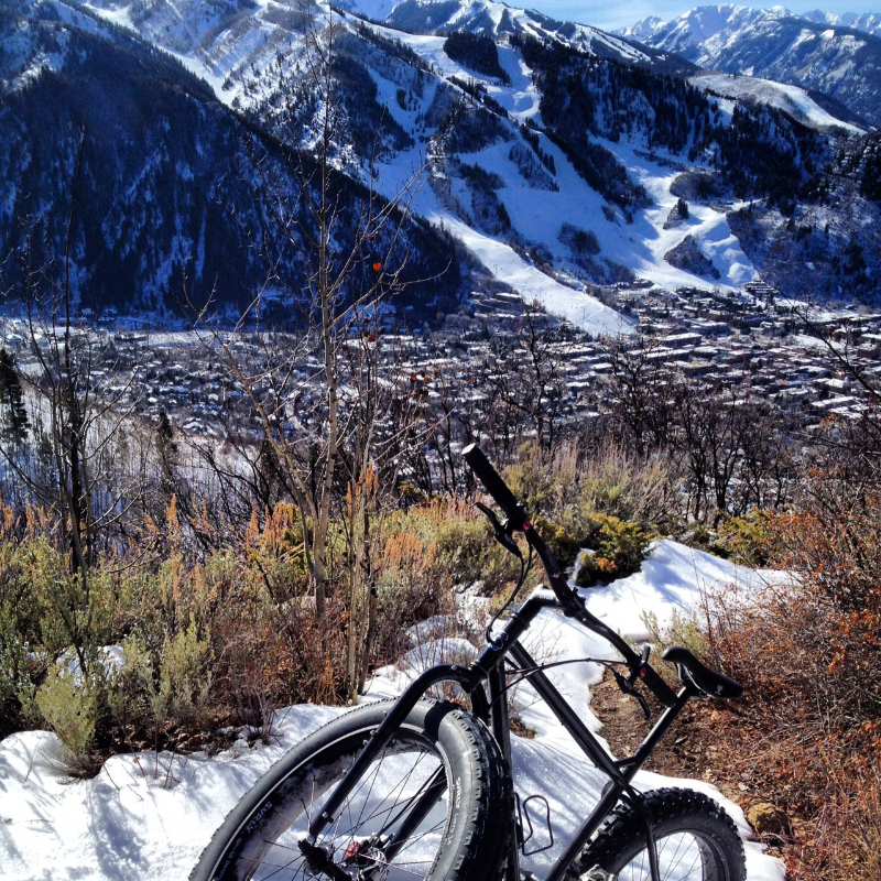 bike with snow and mountain