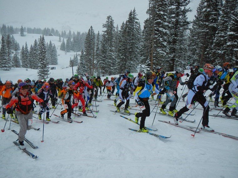 uphill skiier group aspen snowmass