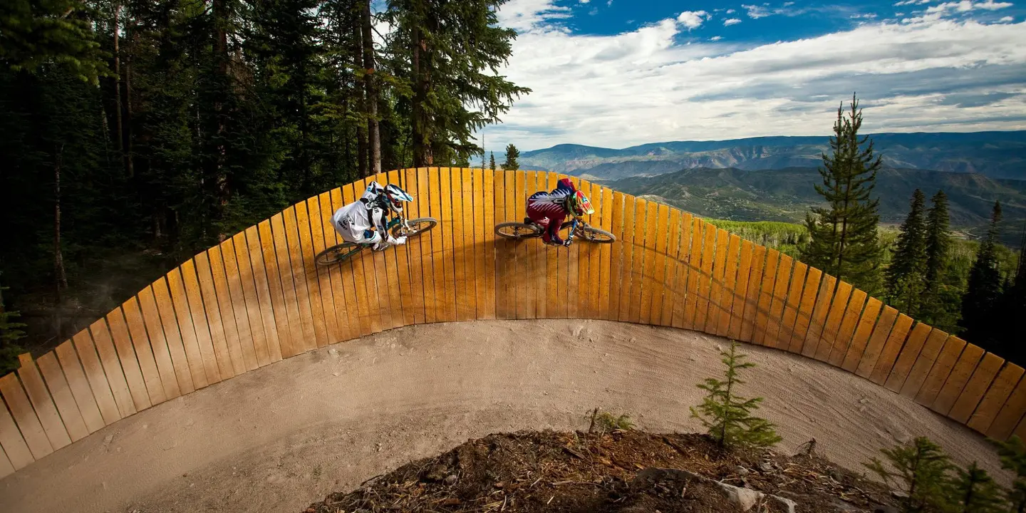 snowmass bike park bikers on ramp