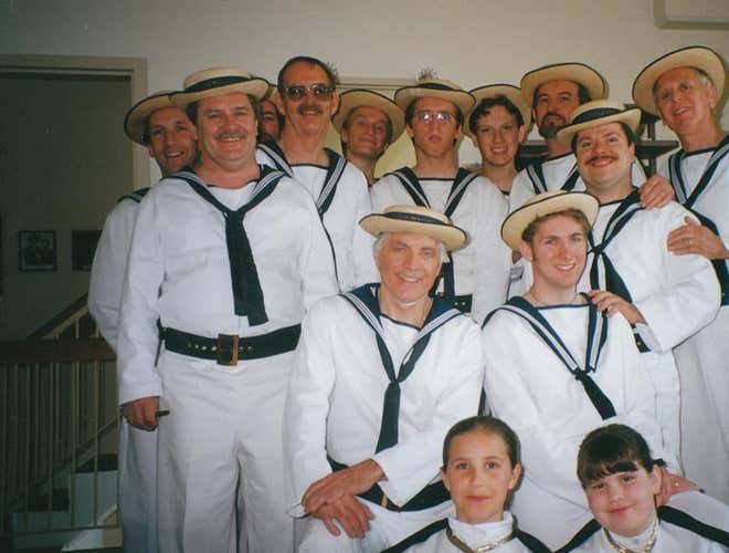 Hugh with the men of HMS Pinafore