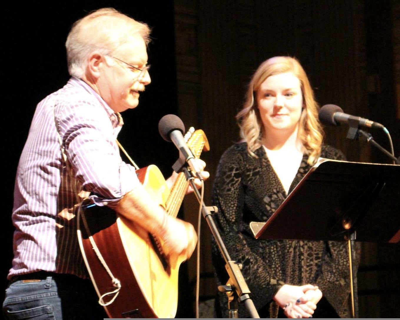 Bob Clark performs with daughter Sam
